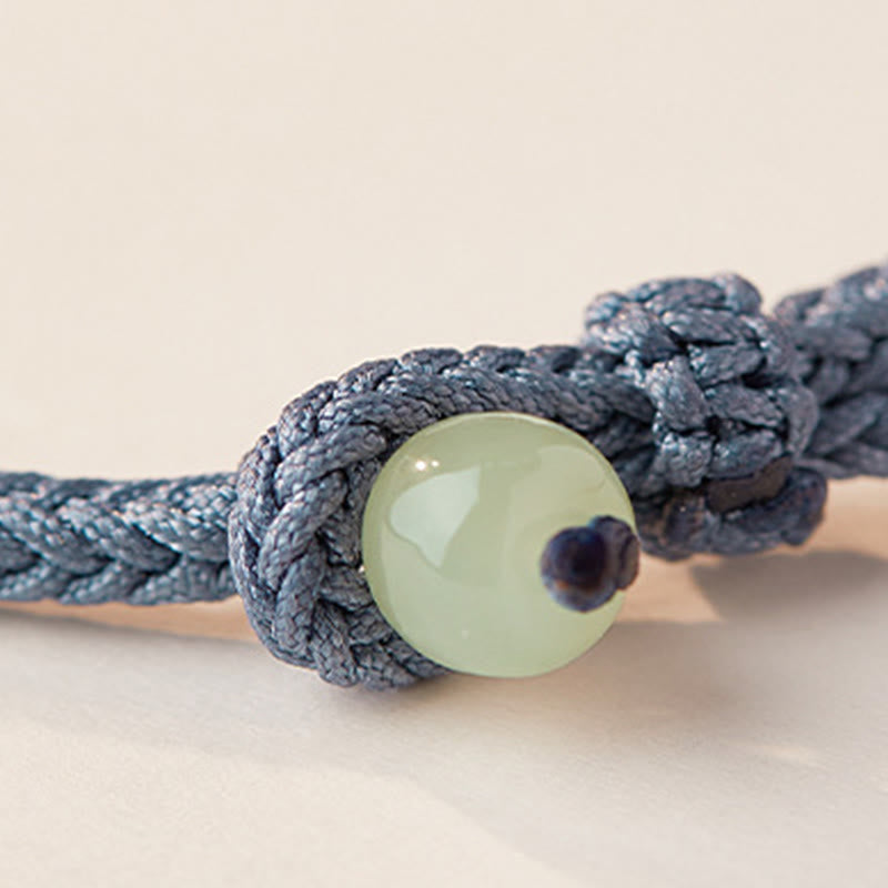 Hetian Jade Lotus Peace Buckle Braided Rope Fortune Bracelet