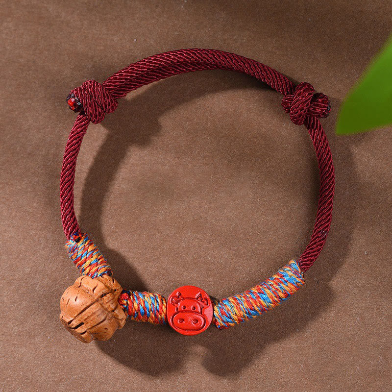 Handmade Chinese Zodiac Red String Peach Pit Cinnabar Luck Bracelet