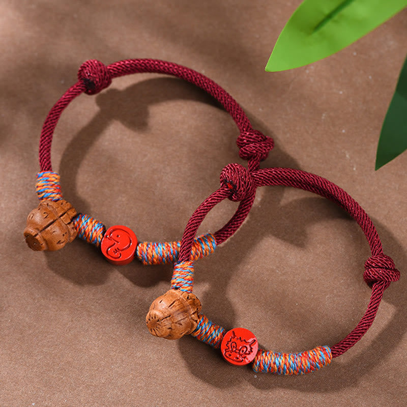 Handmade Chinese Zodiac Red String Peach Pit Cinnabar Luck Bracelet