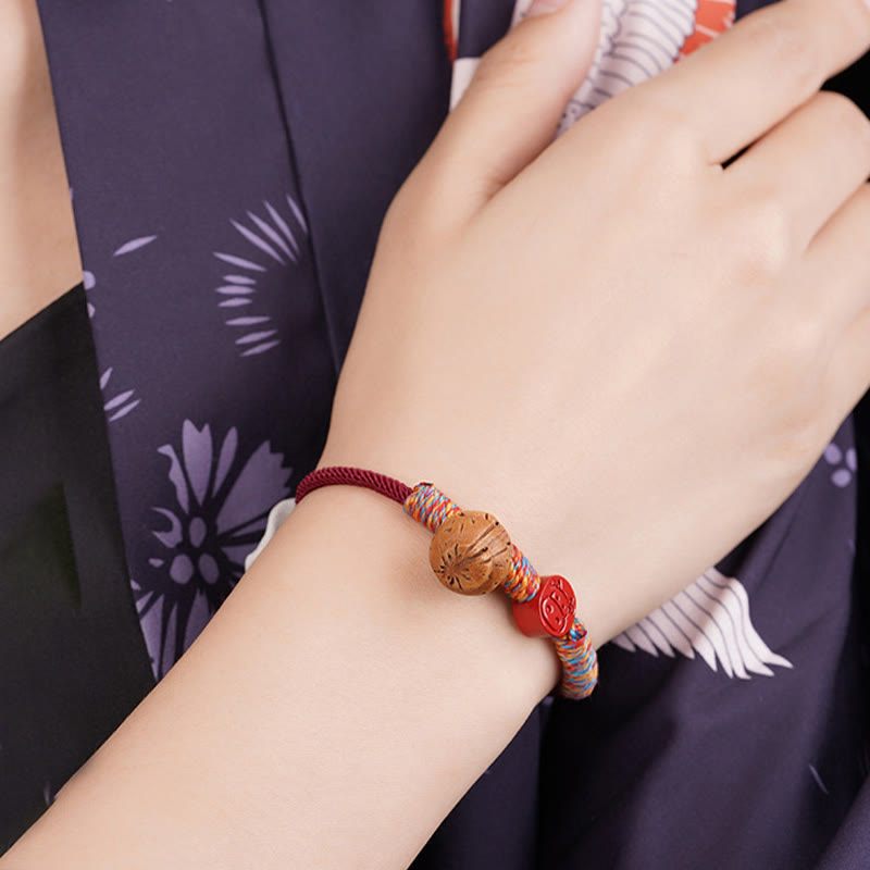Handmade Chinese Zodiac Red String Peach Pit Cinnabar Luck Bracelet