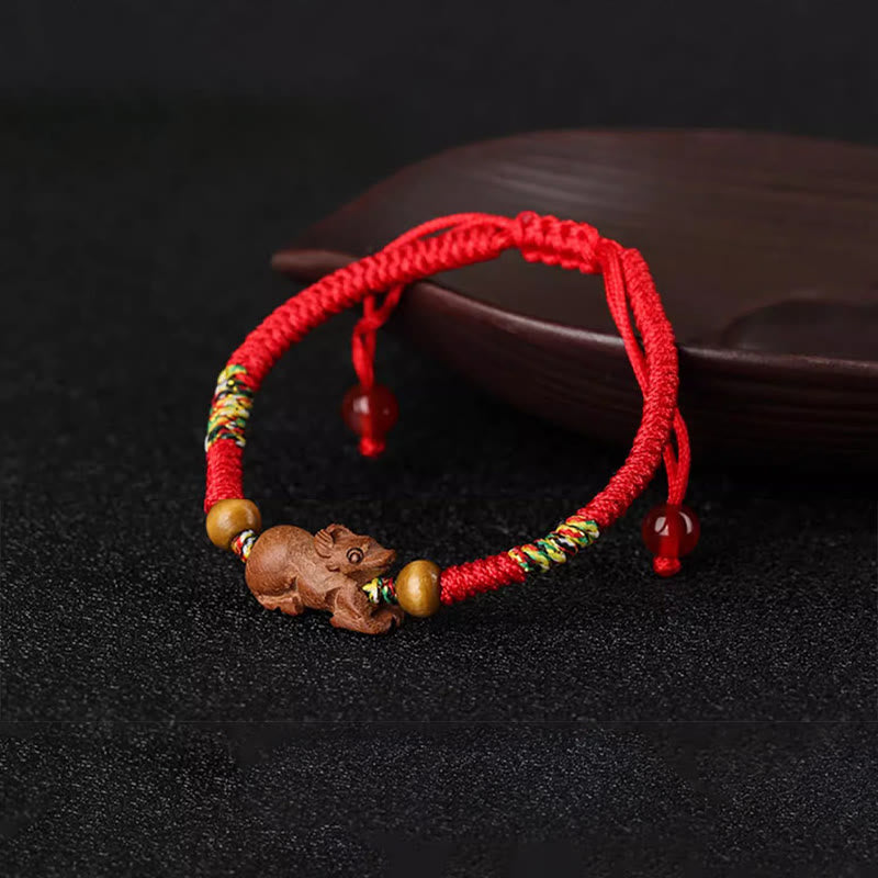 Handmade Chinese Zodiac Red String Peach Wood Luck Bracelet