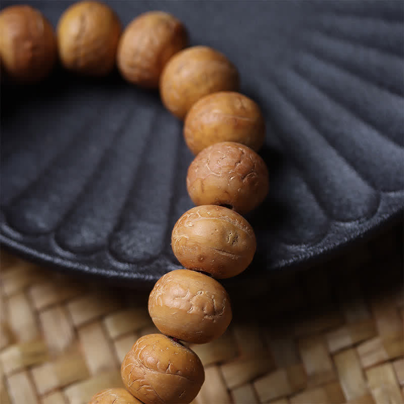 Phoenix Eye Bodhi Wisdom Tibetan Engraved Tassel Wrist Mala