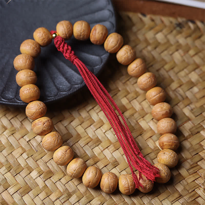 Phoenix Eye Bodhi Wisdom Tibetan Engraved Tassel Wrist Mala