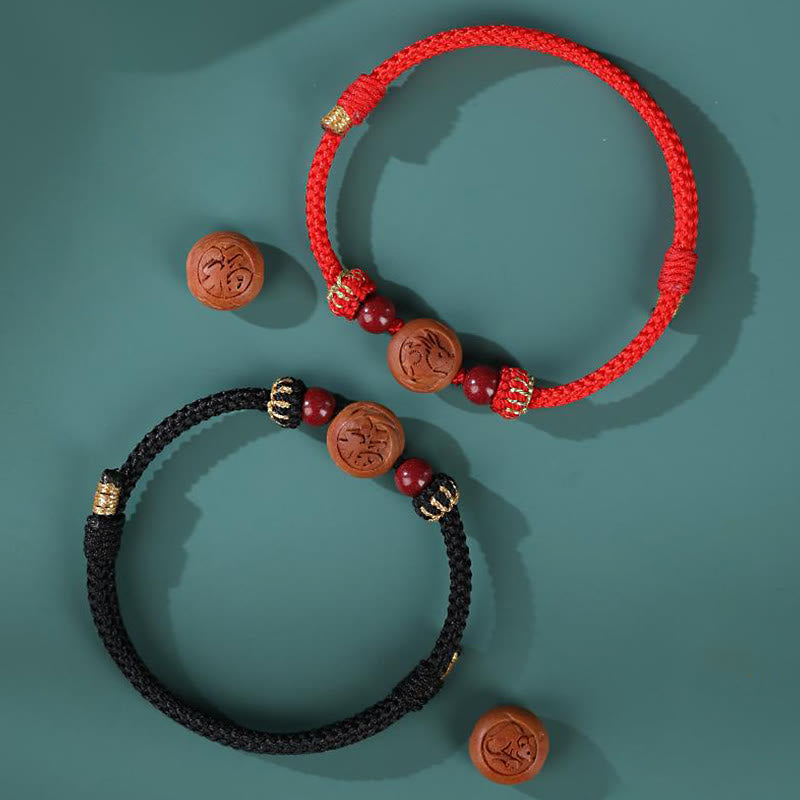 Natural Peach Wood Chinese Zodiac Fu Character Carved Cinnabar Wealth Bracelet